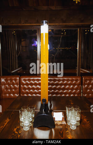 beer tower 5 liters on the table. beer for a big company in a pub Stock Photo