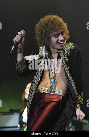 Singer Josh Kiszka is shown performing on stage during a live concert