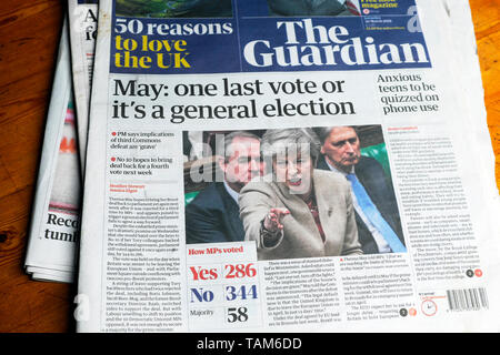 Theresa 'May: one last vote or it's a general election' Brexit Guardian front page newspaper headlines before 3rd House of Commons defeat in British Parliament Westminster London Britain UK Europe EU Stock Photo