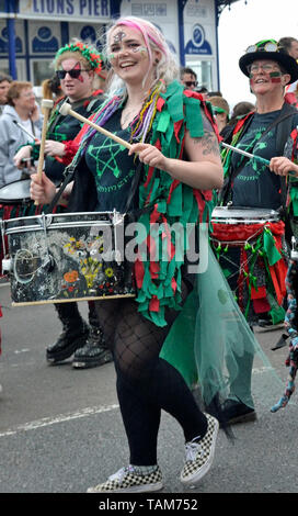 The Pentacle Drummers marching along the seafront at Eastbourne Sunshine Carnival, Sussex, England, UK. May Bank Holiday 2019 Stock Photo