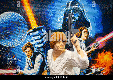 Lego artwork showing Luke Skywalker, Princess Leia, Han Solo, and Darth Vader at Star Wars Celebration 2019 - Chicago, IL Stock Photo