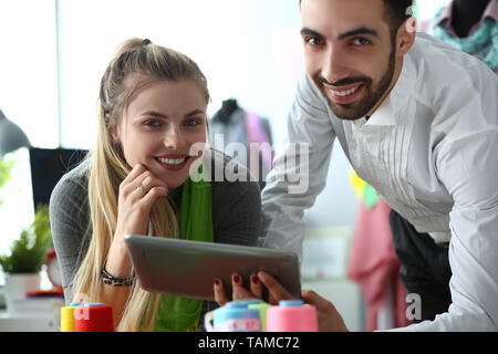 Modern Technology in Dressmaking Sewing Service Stock Photo
