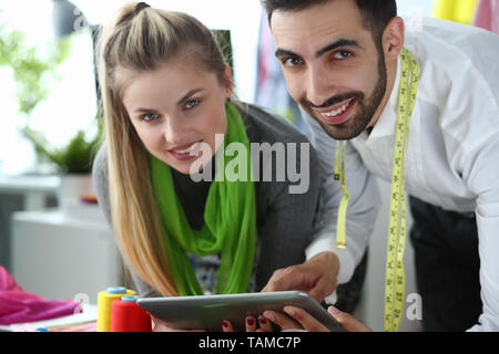 Gadget Technology in Sewing Tailoring Concept Stock Photo