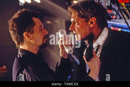 AIR FORCE ONE 1997 film with Harrison Ford at right as US President James Marshall and Gary Oldman as hijacker Ivan Korshunov Stock Photo