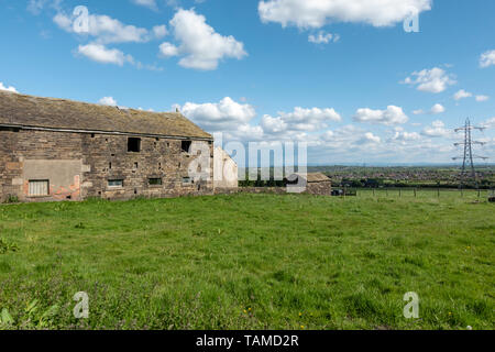 Old Farm Barn now converted into houses in Bolton Stock Photo