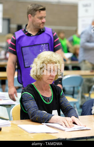 Hereford, UK. 26th May, 2019.  Election staff count ballot papers in Hereford as part of the UK wide European Elections - The Hereford votes are part of the West Midlands region and will return 7 MEPs - overall the UK will return 73 MEPs to the European Parliament. Photo Steven May / Alamy Live News Stock Photo