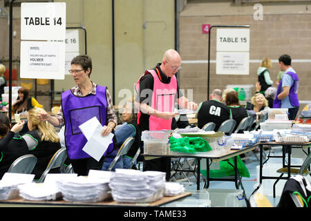 Hereford, UK. 26th May, 2019.  Election staff count ballot papers in Hereford as part of the UK wide European Elections - The Hereford votes are part of the West Midlands region and will return 7 MEPs - overall the UK will return 73 MEPs to the European Parliament. Photo Steven May / Alamy Live News Stock Photo