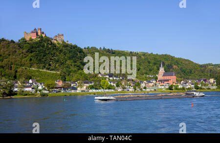 Cargo ship on the Rhine river at Oberwesel, above the Schönburg castle, Upper Middle Rhine Valley, Rhineland-Palatinate, Germany Stock Photo