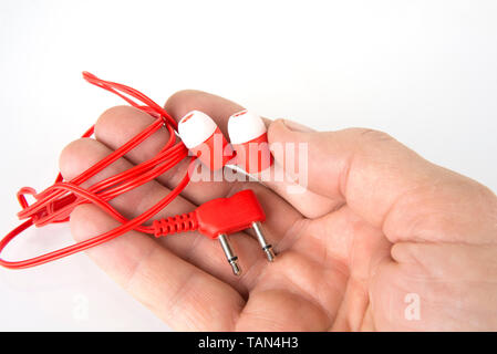 Disposable headphones in airplane for music and movies Stock Photo