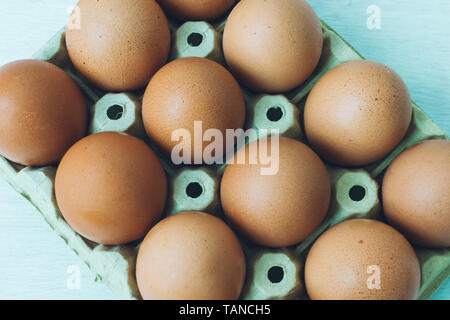 a dozen of eggs in an egg carton Stock Photo