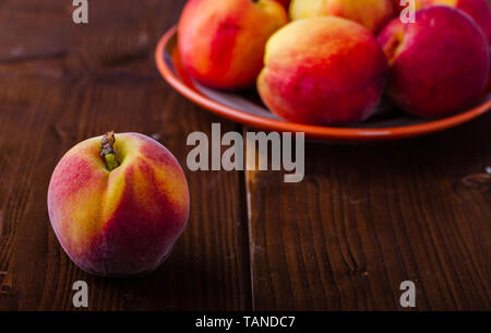 Fruits. Fresh peaches. The fruit is ideal for slimming. Fruit in the diet. Stock Photo