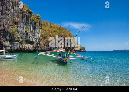 Motorised outrigger boats on the island of Palawan in the Philippines Stock Photo