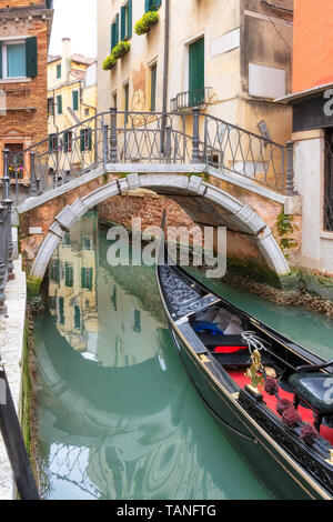 Traditional Gondolas on canal in Venice, Italy. Stock Photo