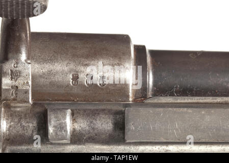 An imperial Schutztruppengewehr 98, Spandau 1901 Cal. 8 x 57, no. 2692. Matching numbers including screws, except for lock. Good bore. Bent bolt handle. Rear sight base scaled 2 - 20. Receiver head signed crown/SPANDAU/1901, barrel root marked 'S'. Stamp plate with marking of the imperial protection force in German South West Africa 'K.S.792. S'. Original barrel finish, lock and receiver polished white, spotted. Matching-numbered, dark walnut stock with various imperial acceptance marks, hair crack on the right behind bolt handle. Strapping with , Additional-Rights-Clearance-Info-Not-Available Stock Photo