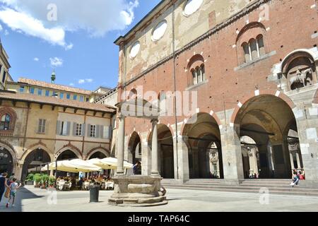 Milan/Italy - July 15, 2016: Mercanti square, Merchants square, medieval stunning outlook and ancient architecture in Milan in a sunny summer day. Stock Photo