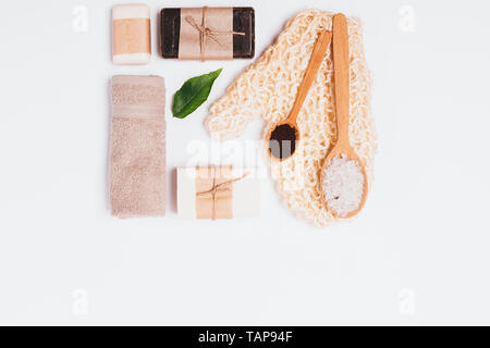 Organic spa cosmetics and items on white background, flat lay arrangement. Stock Photo