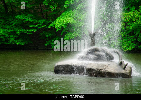 Fountain in form of snake with open mouth. Stock Photo