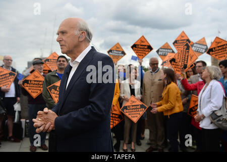 Liberal Democrats leader Sir Vince Cable talks to activists as they celebrate the best ever European Election result in the party's history in central London. Stock Photo
