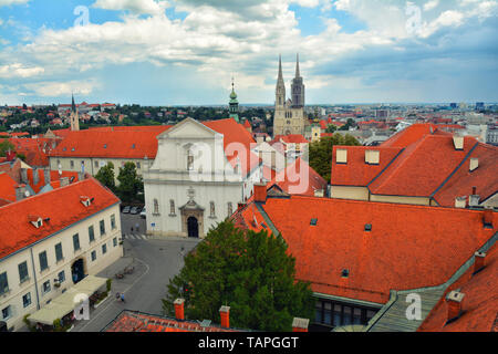 Amazing colorful rooftops and skyline of  Zagreb Old town, Croatia. St. Catherine's Church. Stock Photo