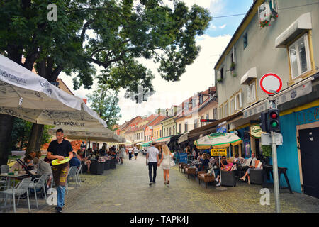 City street view in the Old Town of Zagreb, Croatia. Tkalciceva beautiful pedestrian street lined with restaurants and cafes. Stock Photo