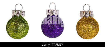 Glittering Christmas tree baubles detail. Isolated on white background. Decorative ornaments set. Fragile colored New Year balls: green, purple, gold. Stock Photo