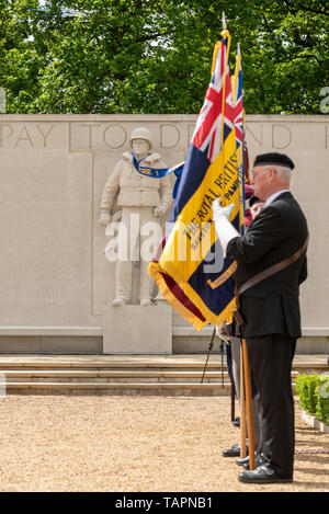 Memorial Day is a federal holiday in the US dedicated  to remembering and honouring people who have died while serving in the US Armed Forces. A commemoration service was held at the Cambridge American Cemetery in the UK where 3811 US war dead are interred and another 5127 missing are remembered on a memorial wall. Military personnel attended the ceremony alongside family of those honoured and public Stock Photo