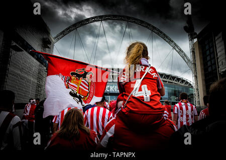 London, UK. 26th May, 2019. A girl is carried on her father's shoulders down Wembley Way to watch Sunderland take on Charlton in the League One play-off final. Charlton won 2-1 with a last minute winner. (c) Credit: Paul Swinney/Alamy Live News Stock Photo