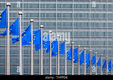 26 May 2019, Belgium, Brüssel: European flags flutter in the wind in front of the Berlaymont building, the seat of the European Commission. From 23 May to 26 May, the citizens of 28 EU states will elect a new parliament. Photo: Marcel Kusch/dpa