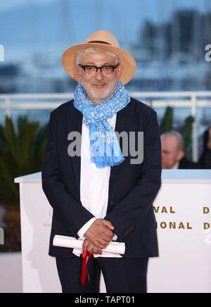 (190526) -- CANNES, May 26, 2019 (Xinhua) -- Director Elia Suleiman, winner of the special mention award for the film 'It Must Be Heaven' poses during a photocall at the 72nd Cannes Film Festival in Cannes, France, on May 25, 2019. The curtain of the 72nd edition of the Cannes Film Festival fell on Saturday evening, with South Korean movie 'Parasite' winning this year's most prestigious award, the Palme d'Or. (Xinhua/Gao Jing) Stock Photo