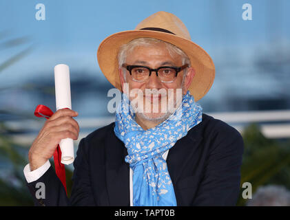 (190526) -- CANNES, May 26, 2019 (Xinhua) -- Director Elia Suleiman, winner of the special mention award for the film 'It Must Be Heaven' poses during a photocall at the 72nd Cannes Film Festival in Cannes, France, on May 25, 2019. The curtain of the 72nd edition of the Cannes Film Festival fell on Saturday evening, with South Korean movie 'Parasite' winning this year's most prestigious award, the Palme d'Or. (Xinhua/Gao Jing) Stock Photo