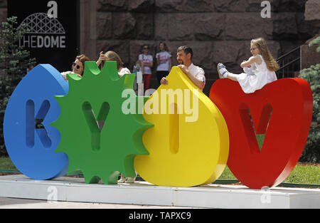 Kiev, Ukraine. 26th May, 2019. Ukrainians pose for a photo with letters reading KYIV, in day of the city, in Kiev, Ukraine, on 26 May 2019 Credit: Serg Glovny/ZUMA Wire/Alamy Live News Stock Photo