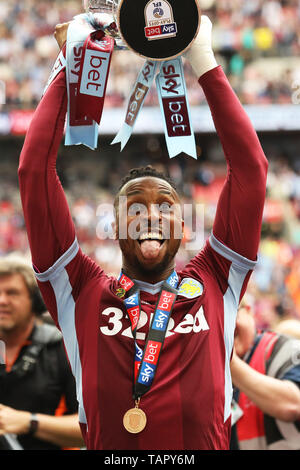 London, UK. 27th May, 2019. Jonathan Kodjia (26) of Aston Villa holds the play off trophy following his sides win during the Sky Bet Championship Play Off Final between Aston Villa and Derby County at Wembley Stadium, London on Monday 27th May 2019. (Credit: Tim Markland | Credit: MI News & Sport /Alamy Live News Stock Photo