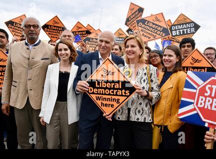 London, UK. 27th May 2019. Vince Cable was joined by activists and the party's three new MEPs for London to celebrate the best ever European Election result in the Party's History.  Pictured : Vince Cable with MEPs Dinesh Dhamija, Luisa Porritt and Irina von Wiese. Lambeth Bridge Road, London Credit: michael melia/Alamy Live News Stock Photo