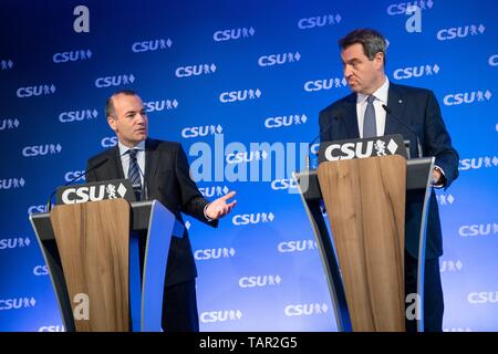 Munich, Germany. 27th May, 2019. Manfred Weber, top candidate for the European elections, gives a press conference on the European elections with Markus Söder (CSU), Prime Minister of Bavaria. Citizens of 28 EU countries have elected a new parliament. Credit: Sina Schuldt/dpa/Alamy Live News Stock Photo