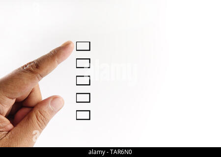 Finger ponting at checkbox isolated on white. Stock Photo
