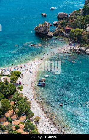 Top view of Isola Bella Nature Reserve. People swimming in the sea by the beach of Taormina, Sicily Stock Photo