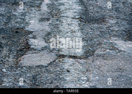 Abstract background of closeup dark uneven asphalt Stock Photo