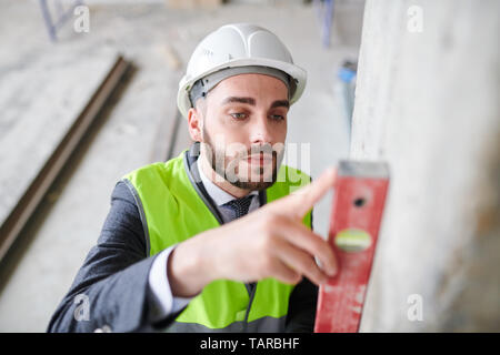 Using level check handtool Stock Photo