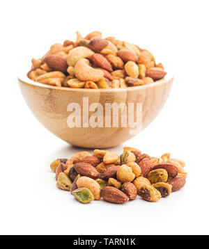 Spicy flavoured nuts. Mix of nuts isolated on white background. Stock Photo