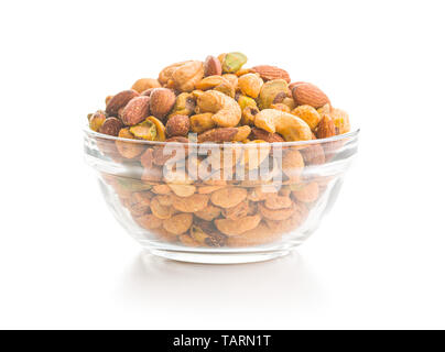 Spicy flavoured nuts. Mix of nuts in bowl isolated on white background. Stock Photo