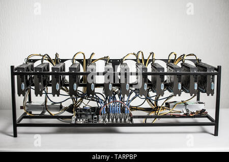 Mining Rig Machine for Cryptocurrency Using Powerful Computer Graphic Cards Stock Photo