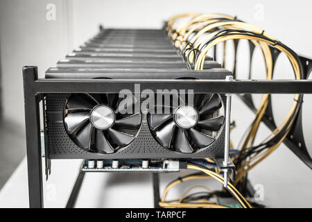 Mining Rig Machine for Cryptocurrency Using Powerful Computer Graphic Cards Stock Photo