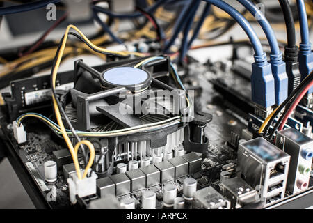 Cryptocurrency Mining Rig Connectors on Motherboard for Graphic Cards Stock Photo