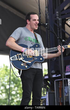 Singer, songwriter and guitarist Tom Russo is shown performing on stage during a 'live' concert appearance with Rolling Blackouts Coastal Fever. Stock Photo