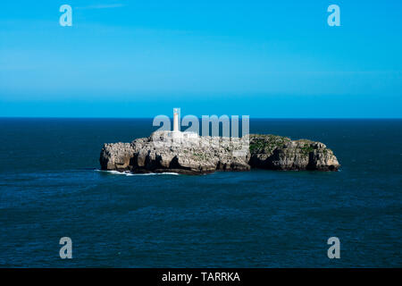 View of the Mouro Island and Lighthouse (Isla y Faro de Mouro). Santander, Spain Stock Photo