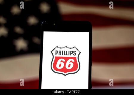 In this photo illustration the Phillips 66 Company logo is seen displayed on a smartphone. Stock Photo