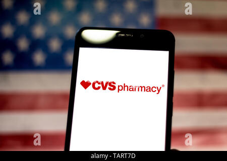 In this photo illustration, the CVS Pharmacy logo is seen displayed on ...