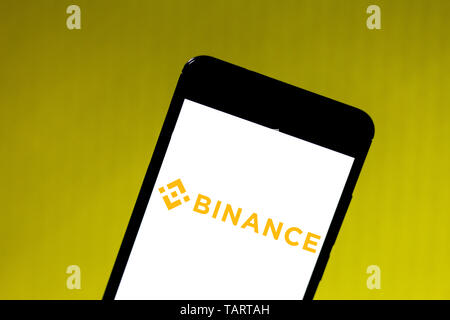 In this photo illustration the Binance logo is seen displayed on a smartphone. Stock Photo