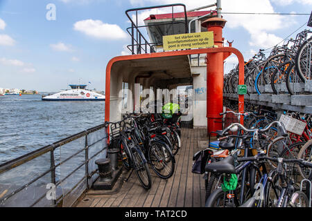 Amsterdam, Netherlands, bicycle parking garage, parking space for bikes at the central station, for over 2100 bicycles, free of charge, on a former pa Stock Photo