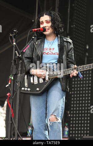 Singer, songwriter and guitarist Heather Baron-Gracie is shown performing on stage during a 'live' stand up appearance with the Pale Waves. Stock Photo